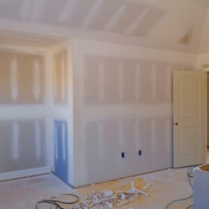 walls-plasterboards-with-room-under-construction-with-finishing-putty-in-the-room_t20_2wRnlJ